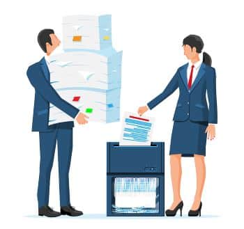 Illustration of two people in business attire standing at an office shredding machine. One person is holding a large stack of papers and the other person is feeding paper into the machine.